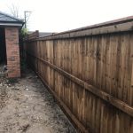Wooden garden paling fencing alongside a new build area in Birmingham.