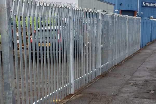 Steel commercial fencing surrounding an industrial area in Birmingham.