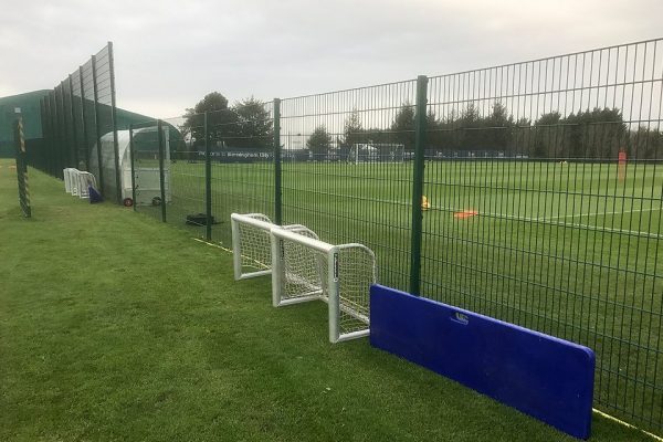 Commercial fencing surrounding a football pitch in Birmingham.