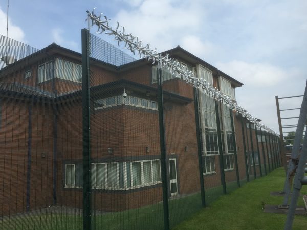 Double mesh fencing surrounding offices in Birmingham. These commercial fences provide great security.