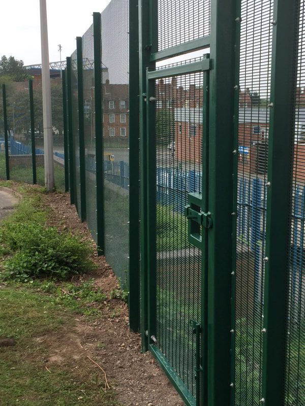 Green double wire mesh gates, with secure locking system. These commercial gates are perfect for securing school yards.