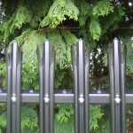 Installed black steel palisade fencing. The commercial fence panel provides high quality security.