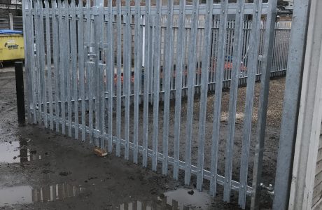 Steel palisade fencing. Commercial fencing provides high quality security for businesses and commercial properties.