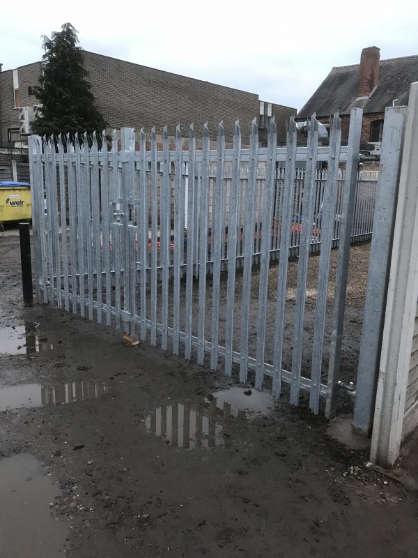 Steel palisade fencing. Commercial fencing provides high quality security for businesses and commercial properties.