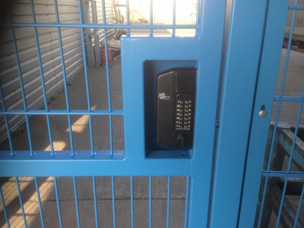 Blue wire mesh gates with secure coded lock.