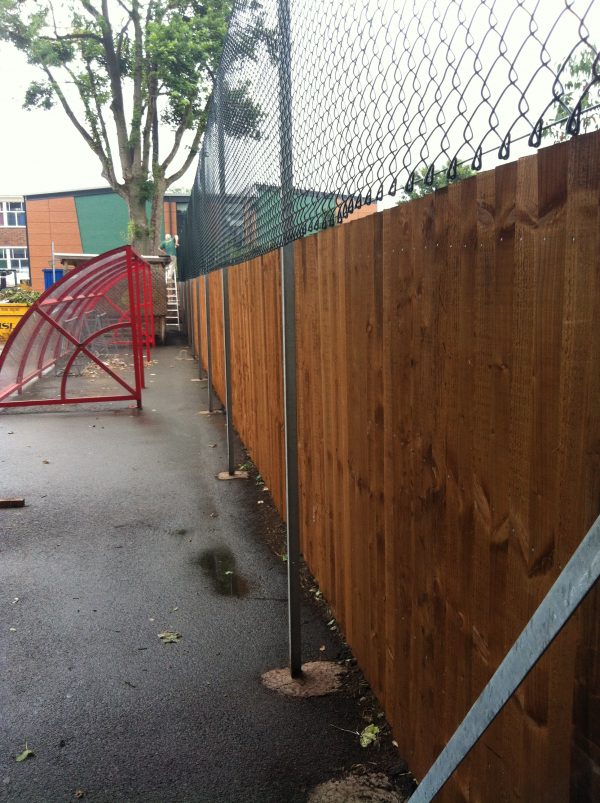 Commercial fencing providing security to a school yard.