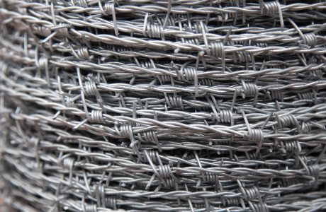 A roll of barbed wire. The provides security and can be used on the top of fencing and walls.