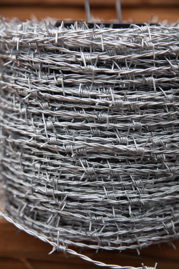 A roll of barbed wire. The provides security and can be used on the top of fencing and walls.