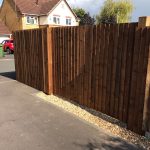 Pre-clad timber gate frame with feather edge boards.