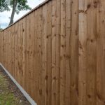 A wooden fence in Birmingham. The fence had feather edge boards.