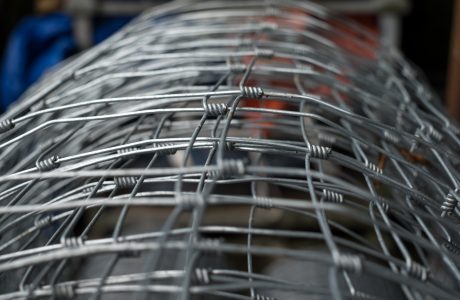 A roll of stock wire that can be used for commercial fencing purposes.