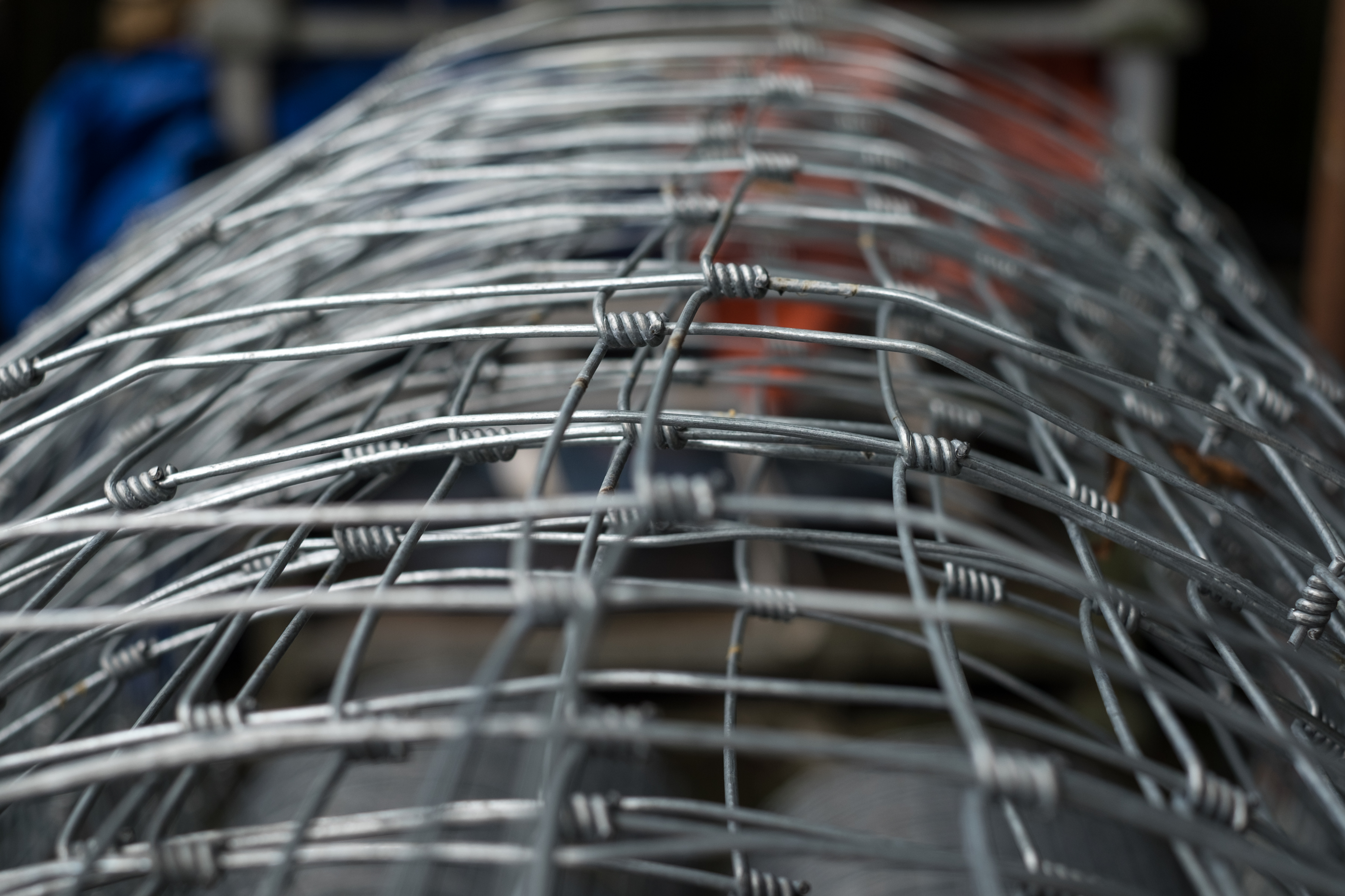 A roll of stock wire that can be used for commercial fencing purposes.