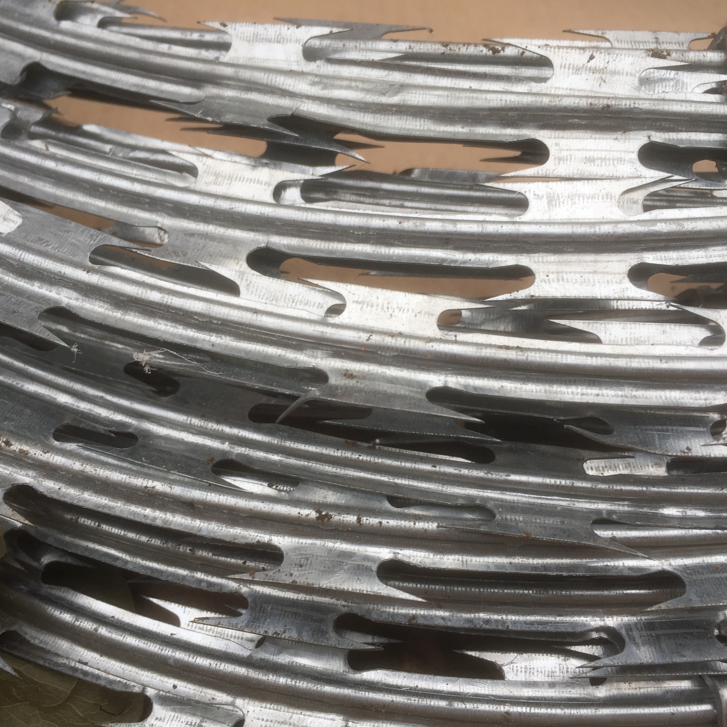 A roll of razor wire. The razor wire is a high quality security fencing product.