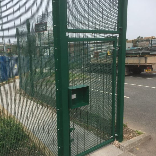 Steel commercial fencing with commercial gate both provided and installed by Hodges & Lawrence Fencing suppliers.