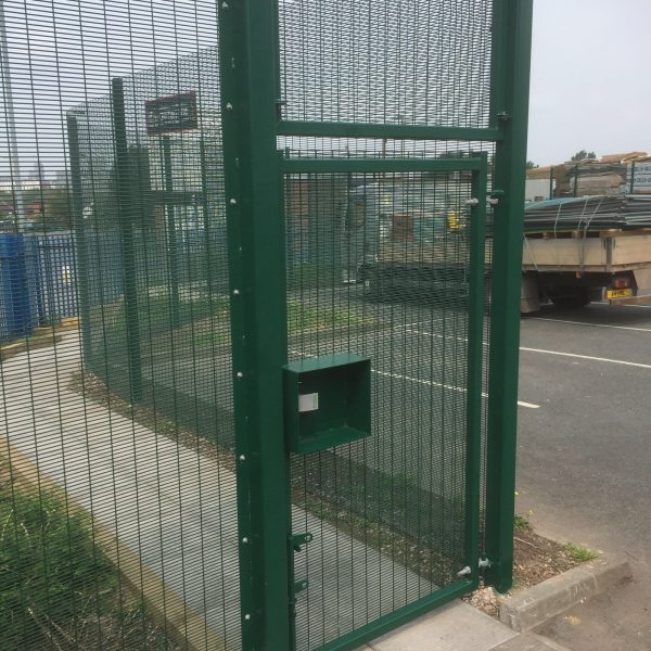 Steel commercial fencing with commercial gate both provided and installed by Hodges & Lawrence Fencing suppliers.
